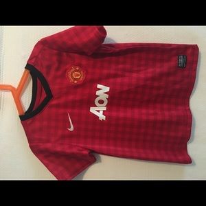 Kids Nike
Manchester United
Boys
Home
Jersey Red
Fan Futbol
Soccer
Activewear